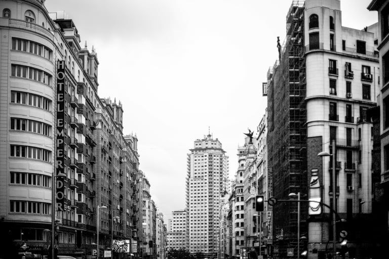 Why do large IT consultancies focus their positions in Madrid?